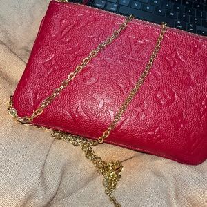 Louis Vuitton double zip pouchette in empriente red